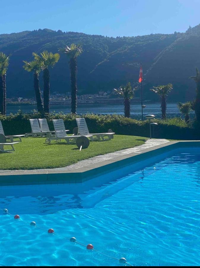 Апартаменты Holiday On The Lake Lugano 2 Биссоне Экстерьер фото