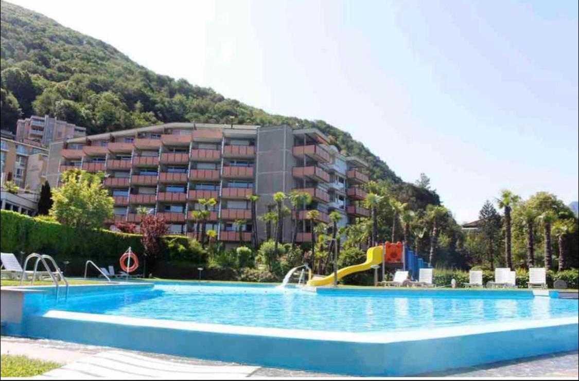 Апартаменты Holiday On The Lake Lugano 2 Биссоне Экстерьер фото