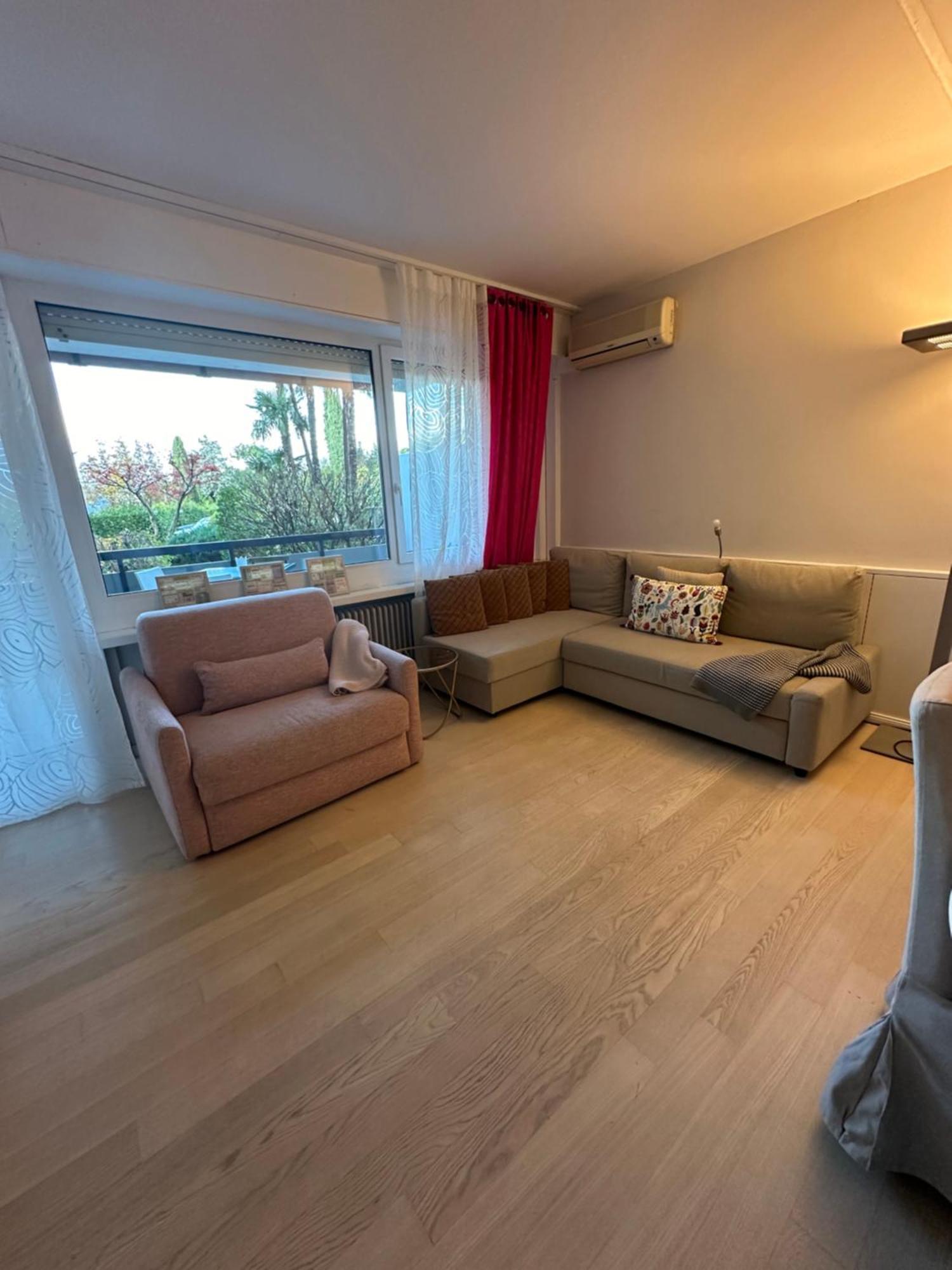 Апартаменты Holiday On The Lake Lugano 2 Биссоне Экстерьер фото